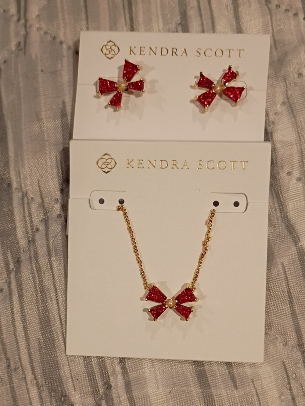 Kendra Scott Gold Bow Necklace and Earring Set with Red Stones